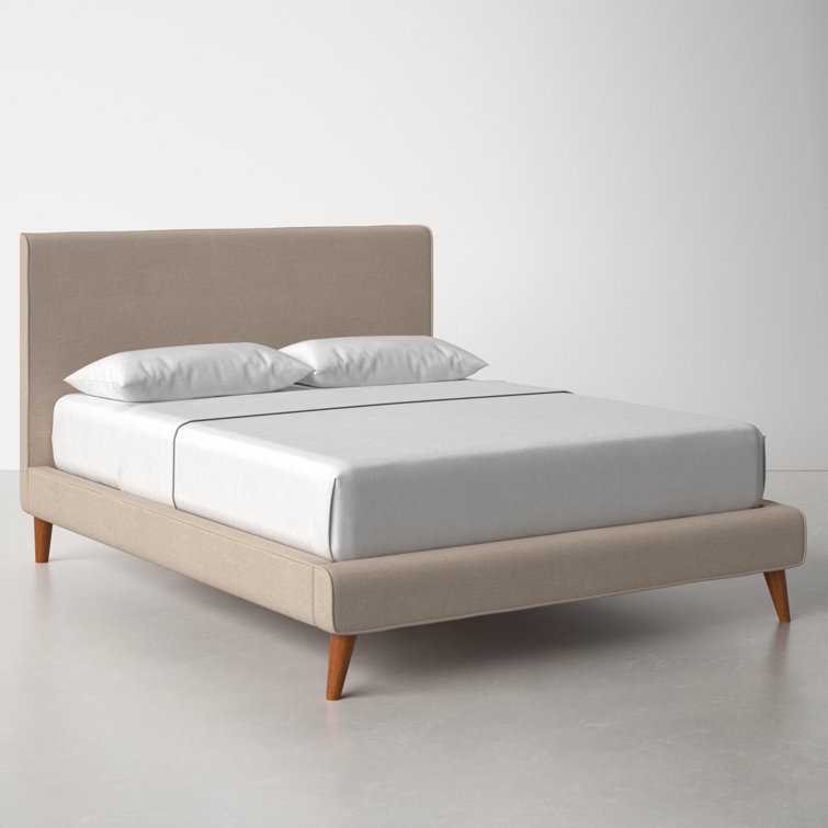 Abril tufted solid wood and upholstered low profile store platform bed